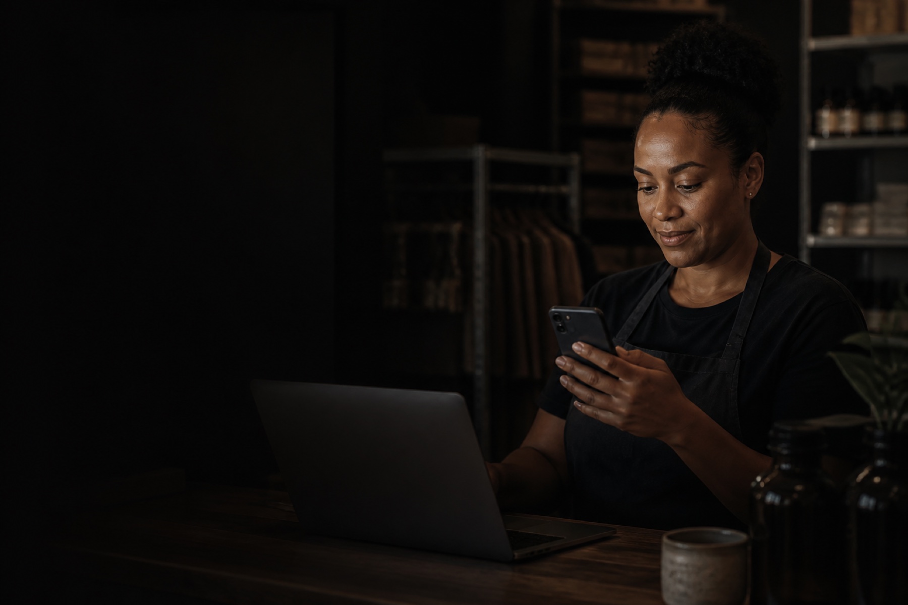 A small-business operator reading an appointment confirmation on her phone.